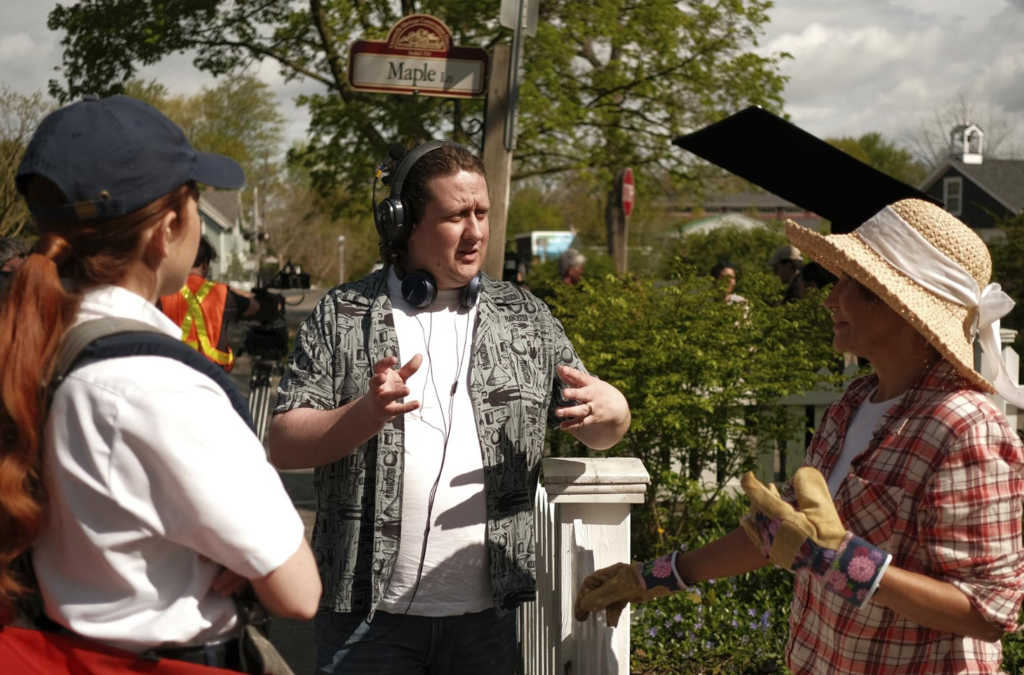 Darcy Love, graduate of Toronto Film School's Film Production Diploma Program, on set directing. 